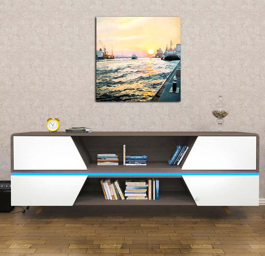 Motiv Hafen im Abendlicht mit Fähre auf der Elbe an einer wand hängend mit Bücherregal